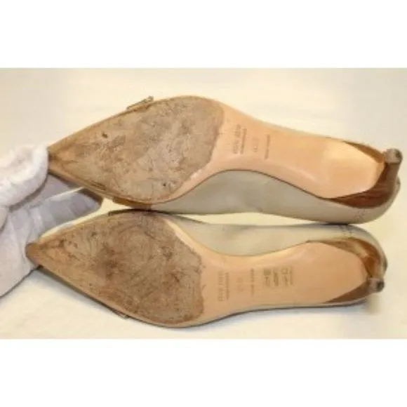 Miu Miu, size EU 39.5/9.5B US, khaki canvas and orange leather, squared, pointy toe, heels with 2" kitten heels, square, orange leather and chrome buckles, wood look heels, and chrome hardware